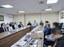 Reunião institucional em sala de conferência.jpeg